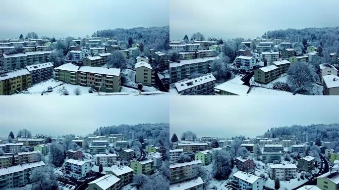 Arial shot of snow covered village in wintertime