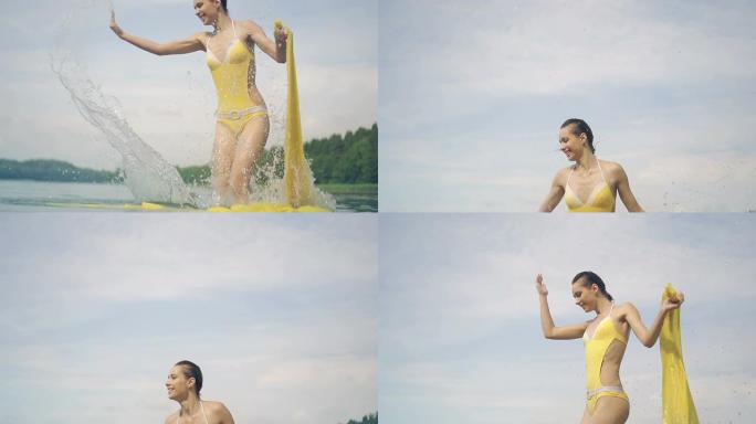 女子抱着黄色围巾跳入水中