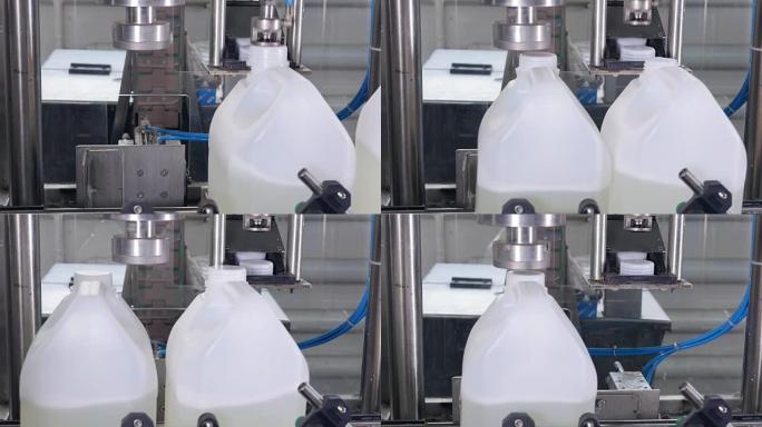 生产机器将瓶盖拧紧在药品上，化学瓶子在输送机上。4K。