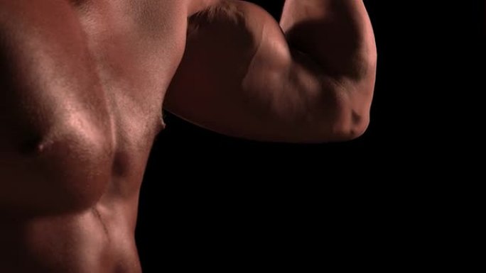 男性健美运动员弯曲肌肉