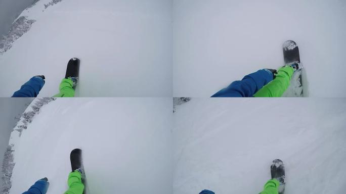 FPV特写: 滑雪者在雪山滑雪场骑着新鲜的粉末雪