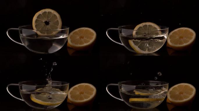 柠檬片落入杯水中
