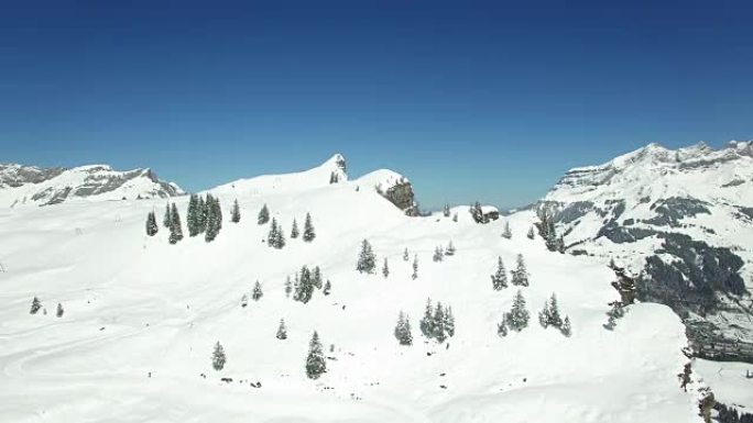 Aerial view of snow covered mountain range with be