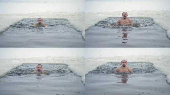 一个人在冰洞里游泳，试图深呼吸。