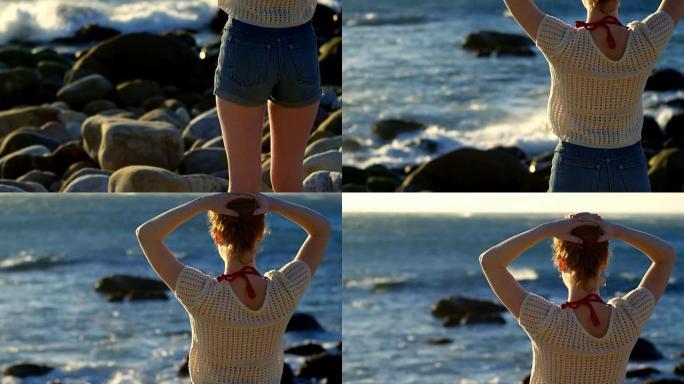 女人站在海边4k附近的头发上