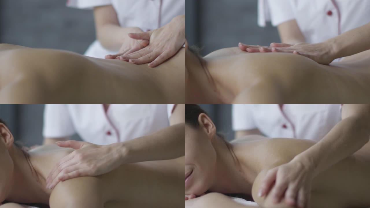 女性手在健康中心做放松按摩的镜头。