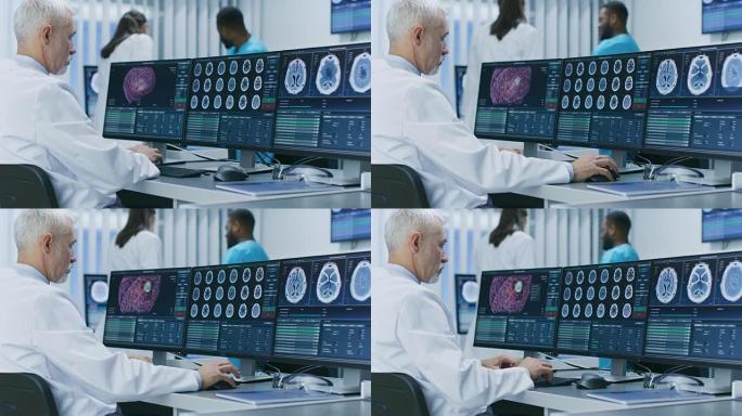 经验丰富的高级科学家在实验室的个人计算机上处理CT/ MRI脑部扫描图像。医学研究中心的神经学家/神