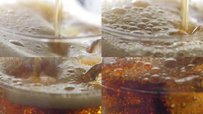 可乐和玻璃杯中的冰。