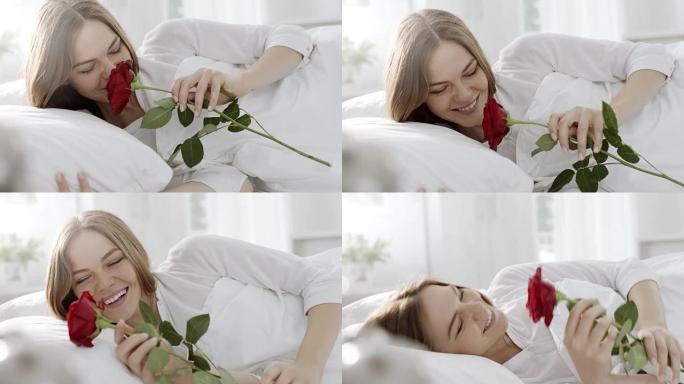 女人在枕头上发现红玫瑰