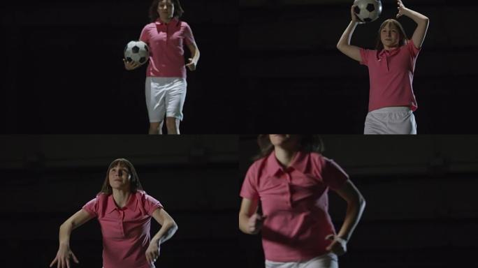 女子足球运动员进行头顶球投掷