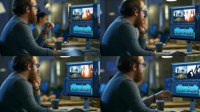 男性视频编辑器在带有两个显示器的个人计算机上处理镜头和声音。他和其他有创造力的人在一个很酷的办公室阁