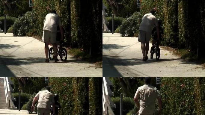 爸爸教孩子骑自行车