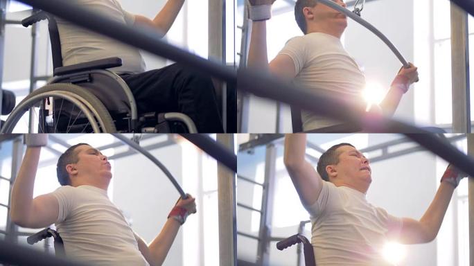 意志坚强的轮椅运动员努力在健身房训练。