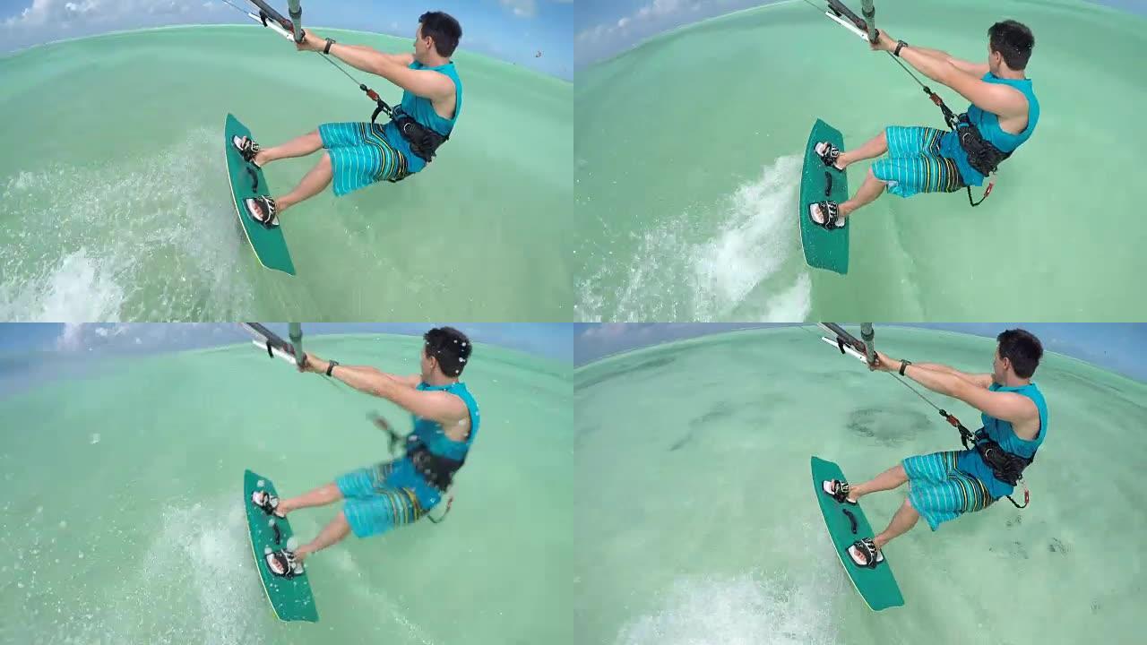 特写: 欢快的年轻风筝冲浪者在桑给巴尔完美的蓝色泻湖中放风筝
