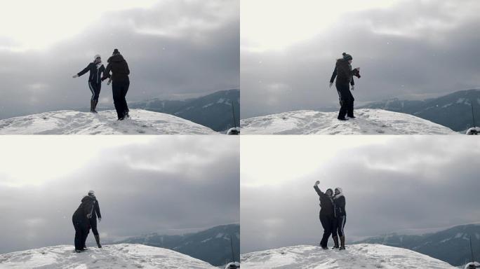 可笑的女友在山顶拍照