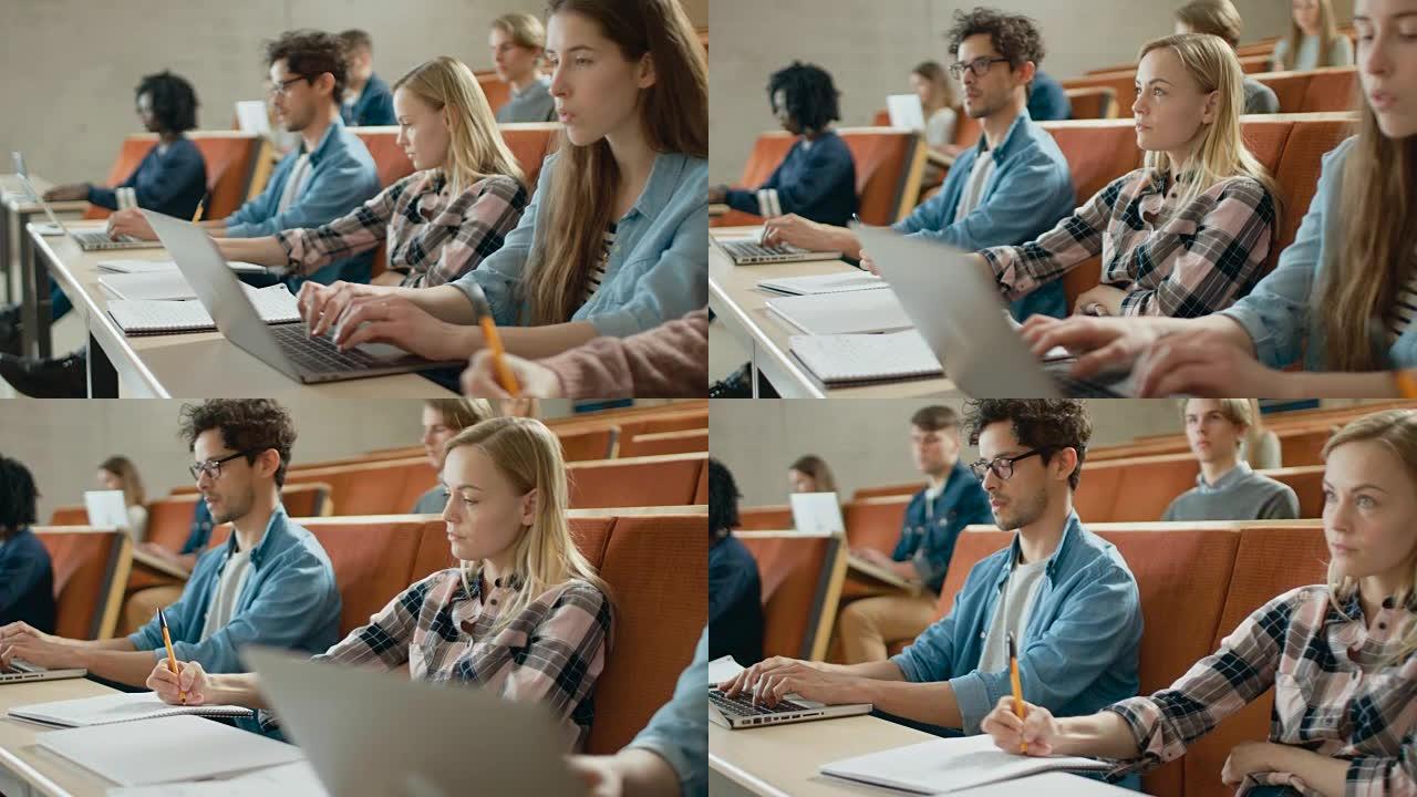 在多民族学生的教室里，一边听讲师一边使用笔记本电脑。有些写在笔记本上。聪明的年轻人在大学学习。