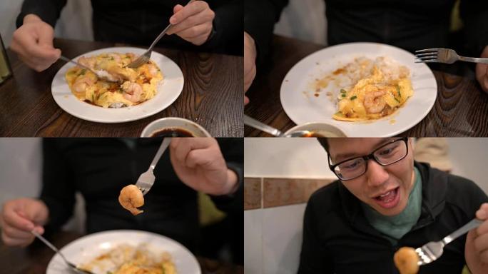 2个男人在米饭上吃炒鸡蛋炒虾的镜头，香港食物