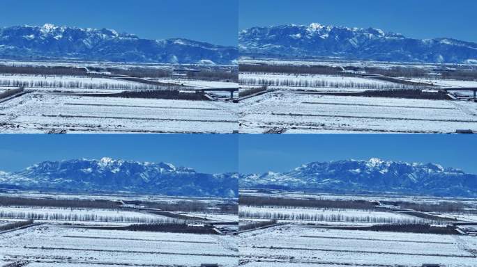 乌鲁木齐远眺高山田野雪景