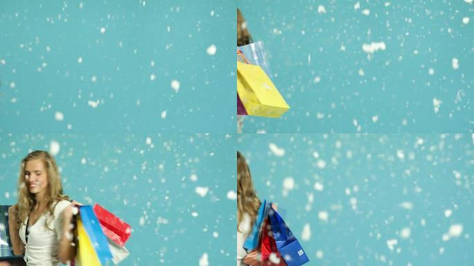 快乐的年轻女人在圣诞节前购物