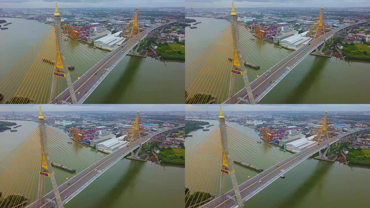 普密蓬大桥工业环桥两次穿越湄南河的鸟瞰图。泰国曼谷新地标的暮色，日落场景