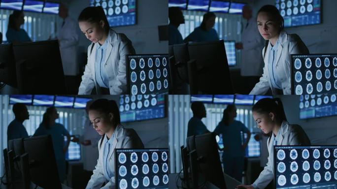 在现代实验室的个人计算机上工作的女科学家/神经科医生。医学研究科学家在神经生理学，科学，神经药理学领