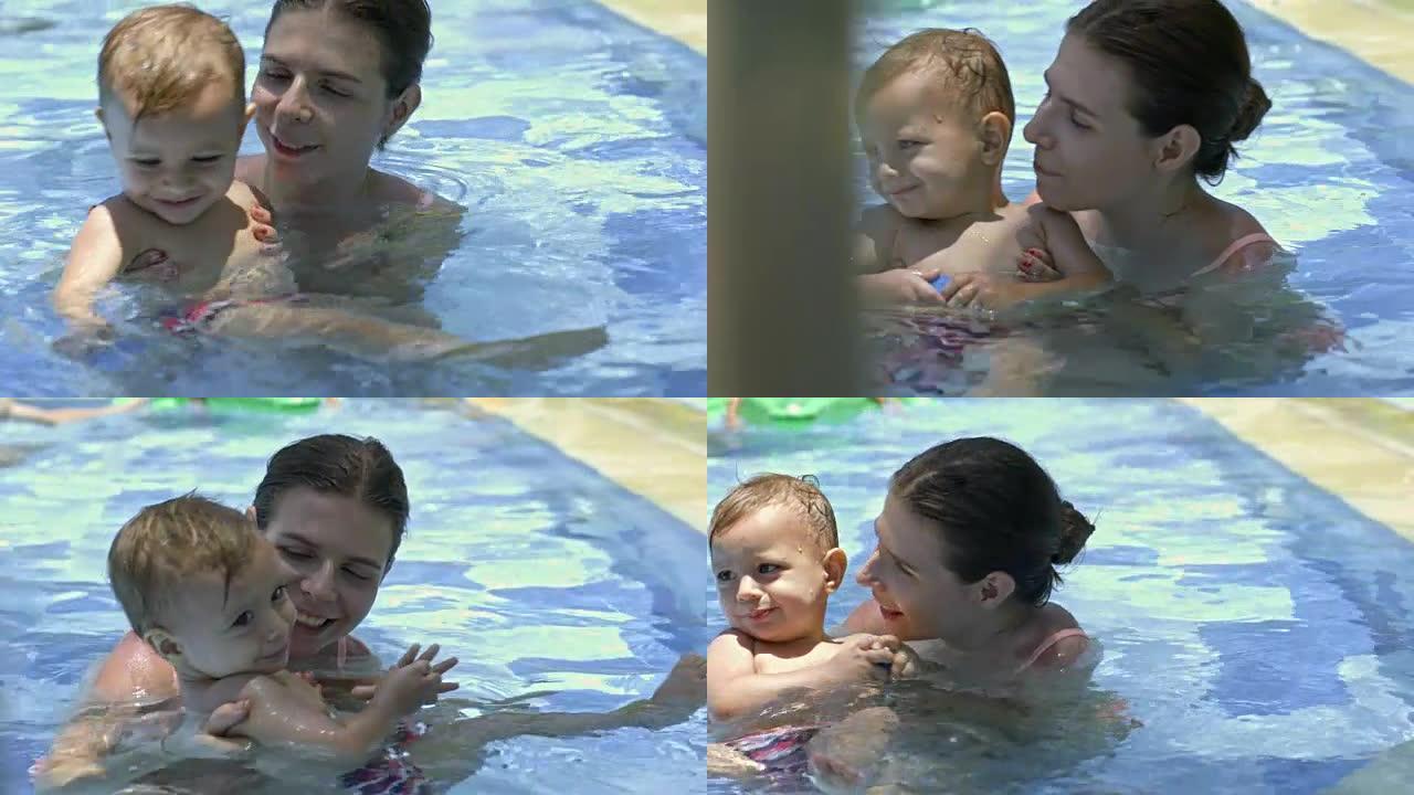 快乐的妈妈和小儿子在游泳池里交往