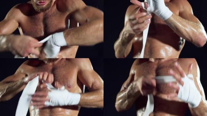 男性拳击手在格斗训练前用白色手包手。拳击手包手。
