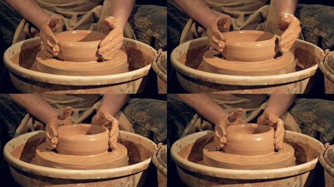 陶工在轮子上塑造了一个基本的浅碗。