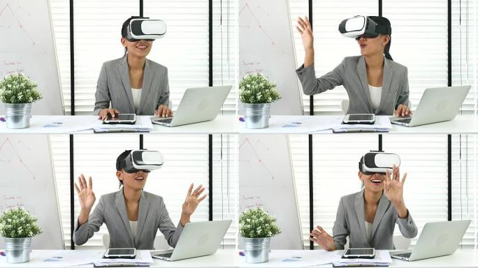 vr眼镜中的女商人与笔记本电脑配合使用