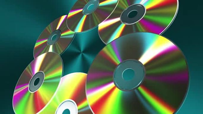 在蓝色背景上旋转cd-dvd光盘。无缝循环。