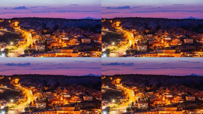 土耳其晚上在卡帕多西亚拥有美丽天空的格雷梅村的延时景色