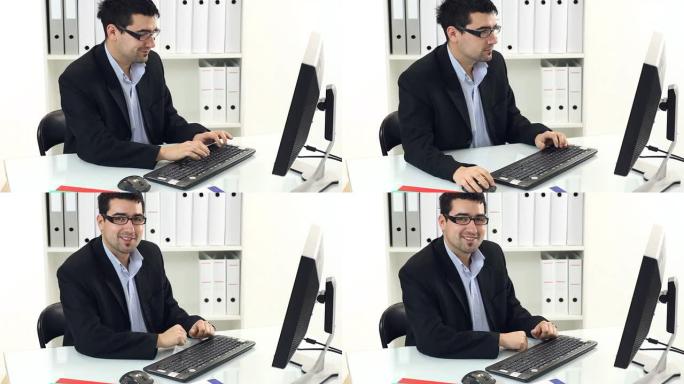 在办公室工作的年轻商人