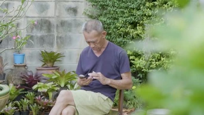 亚洲老人使用手机