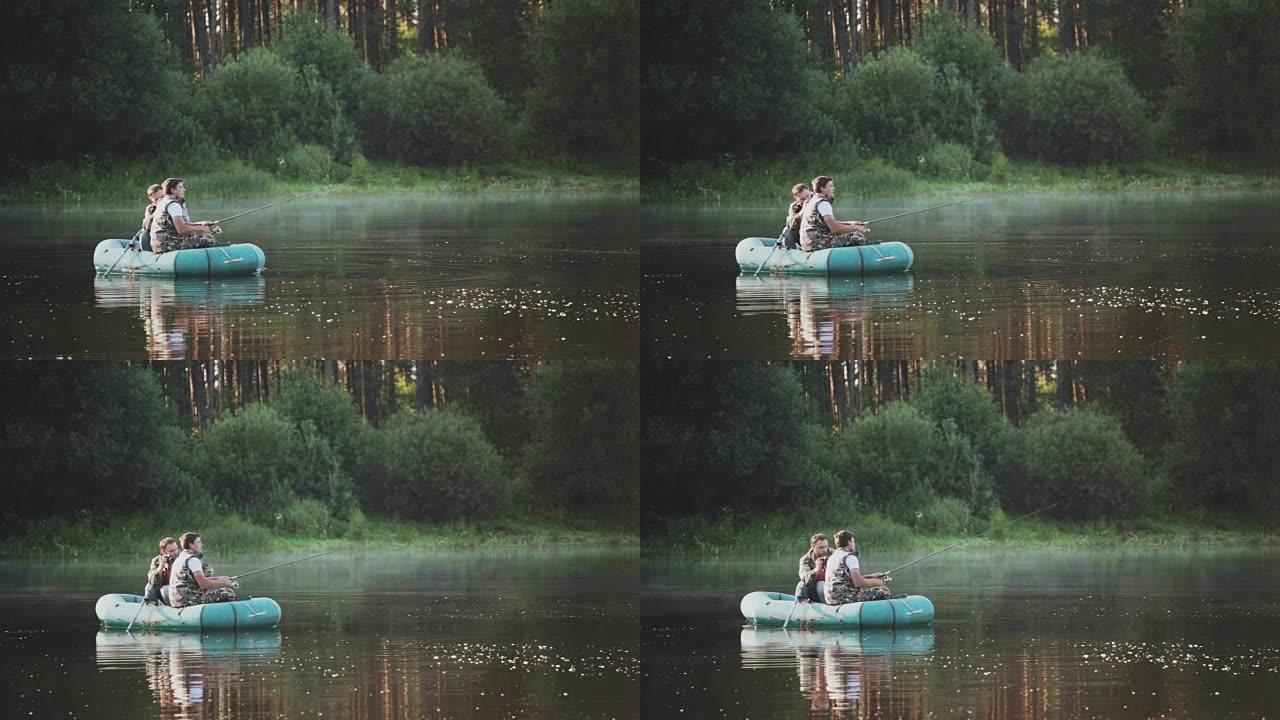 两个费舍尔 (fisher) 爱好，在湖上度过闲暇时光。男子在森林景观上向他的朋友拍摄相机