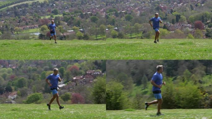 在R3D上拍摄的成熟男子在乡村慢跑