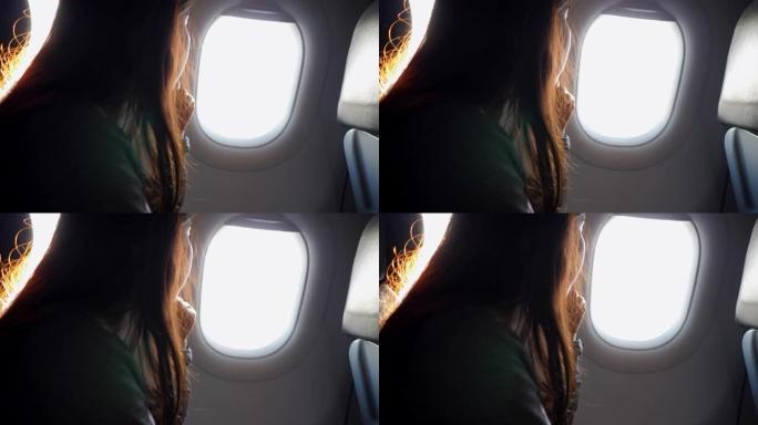 乘飞机飞行的年轻女子