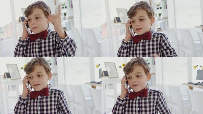 孩子作为业务主管在手机上聊天4k