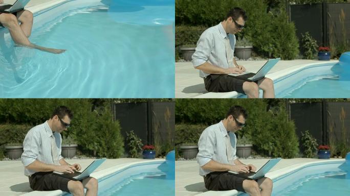 高清: 商人在游泳池旁使用笔记本电脑