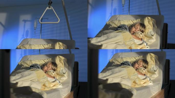 高清: 生病的小男孩在医院睡觉