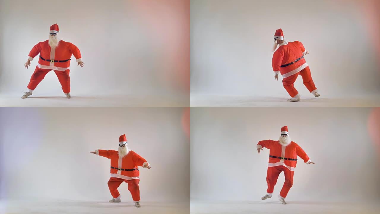 有趣的厚圣诞老人在白色背景上跳舞。4K。