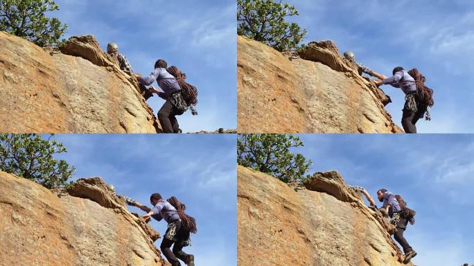 男子帮助他的朋友爬悬崖4k
