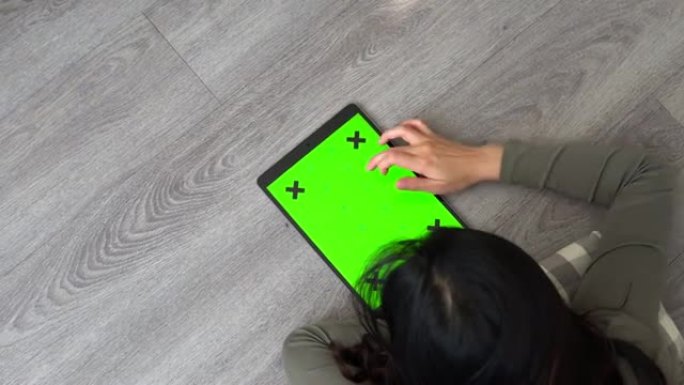 女人使用平板电脑绿屏
