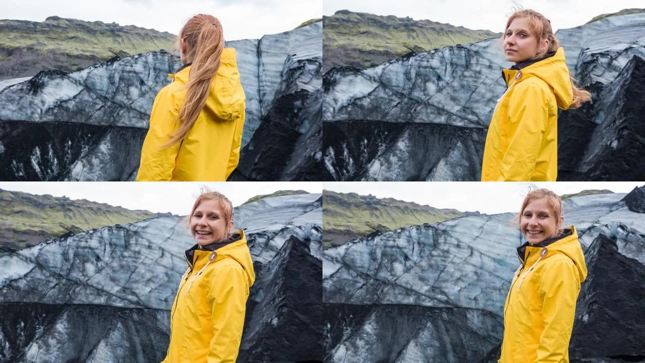 女人欣赏火山灰覆盖的冰川