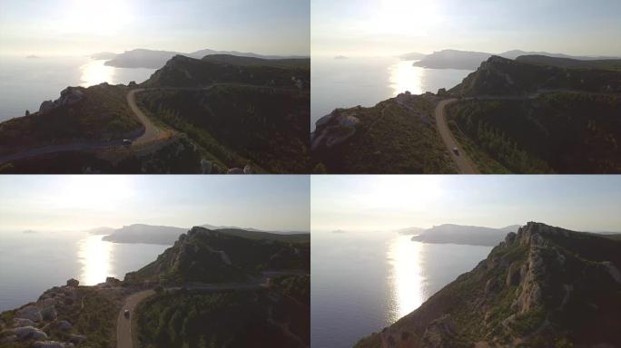 空中: 沿着高高的海洋悬崖顶部的道路行驶