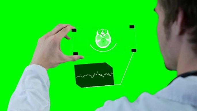 科学家，医生使用未来的触摸屏技术，显示x射线。chromakey上的运动图形