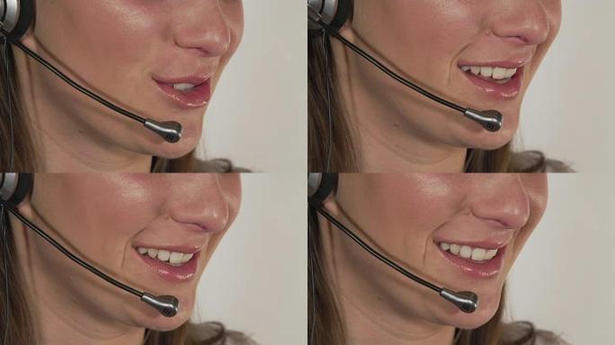 特写: 礼貌的女性技术支持员工与客户在耳机上交谈