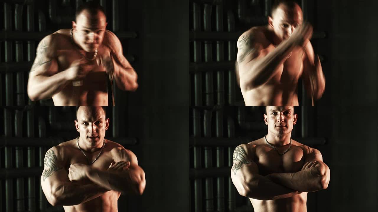 强壮的肌肉男人用扩张器锻炼