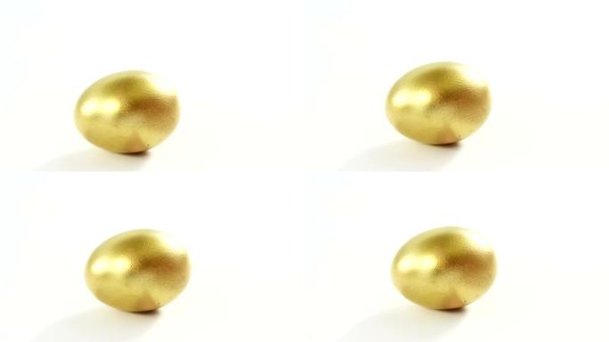 白色背景上的金色复活节彩蛋