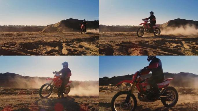 侧面镜头的专业摩托车越野赛摩托车骑手驾驶在沙丘和更远的越野轨道。这是《日落》，赛道上布满了烟雾/灰尘