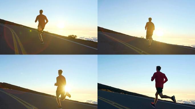 云上日落时在山路上奔跑的年轻人。慢镜头高清